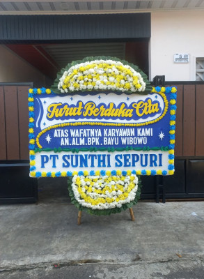 Papan Bunga Duka di Beoga Barat