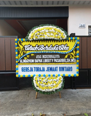 Papan Bunga Duka di Beoga Barat