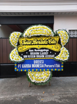 Papan Bunga Duka di Beoga Barat