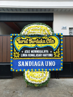 Papan Bunga Duka di Beoga Barat